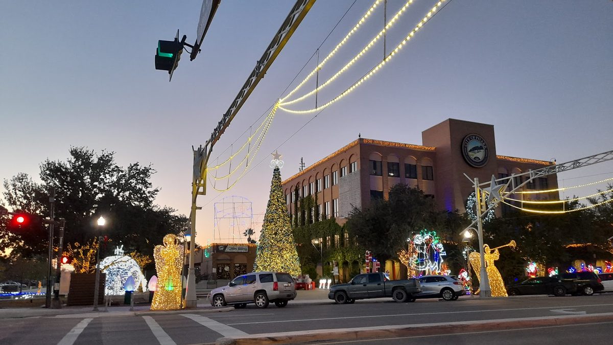 Downtown Pharr, Texas lit up in the evening — part of Ground Patrol's Pharr pet waste removal service area